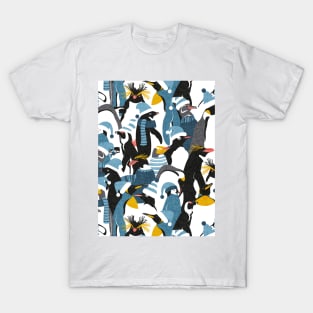 Merry penguins // pattern // black white grey dark teal yellow and coral type species of penguins blue dressed for winter and Christmas season (King, African, Emperor, Gentoo, Galápagos, Macaroni, Adèlie, Rockhopper, Yellow-eyed, Chinstrap) T-Shirt